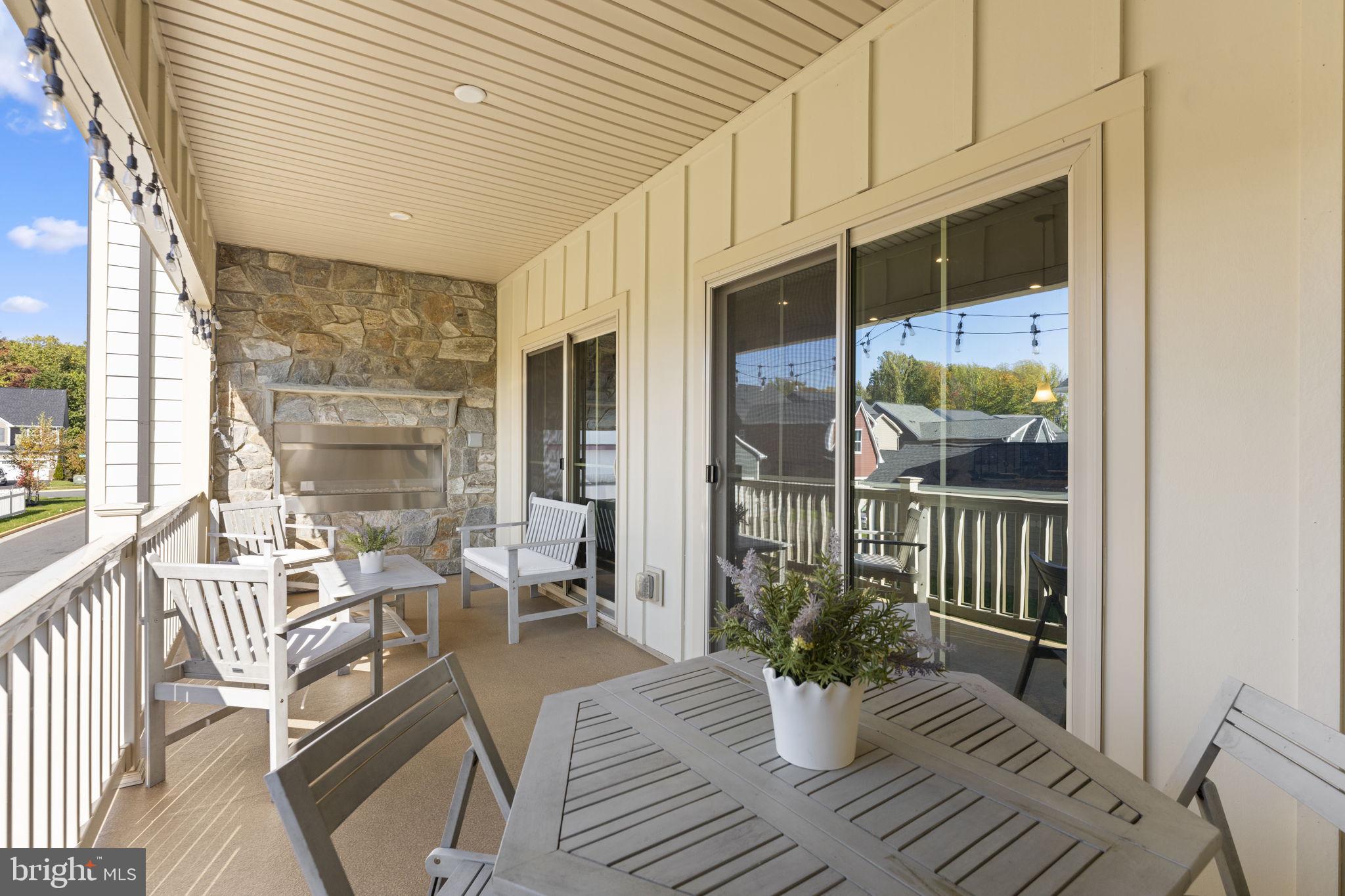 17922 Spotted Oak Road Dumfries, VA 22026 - Photo 23 of 62 Off the Kitchen w/covered Patio & Wall Fireplace