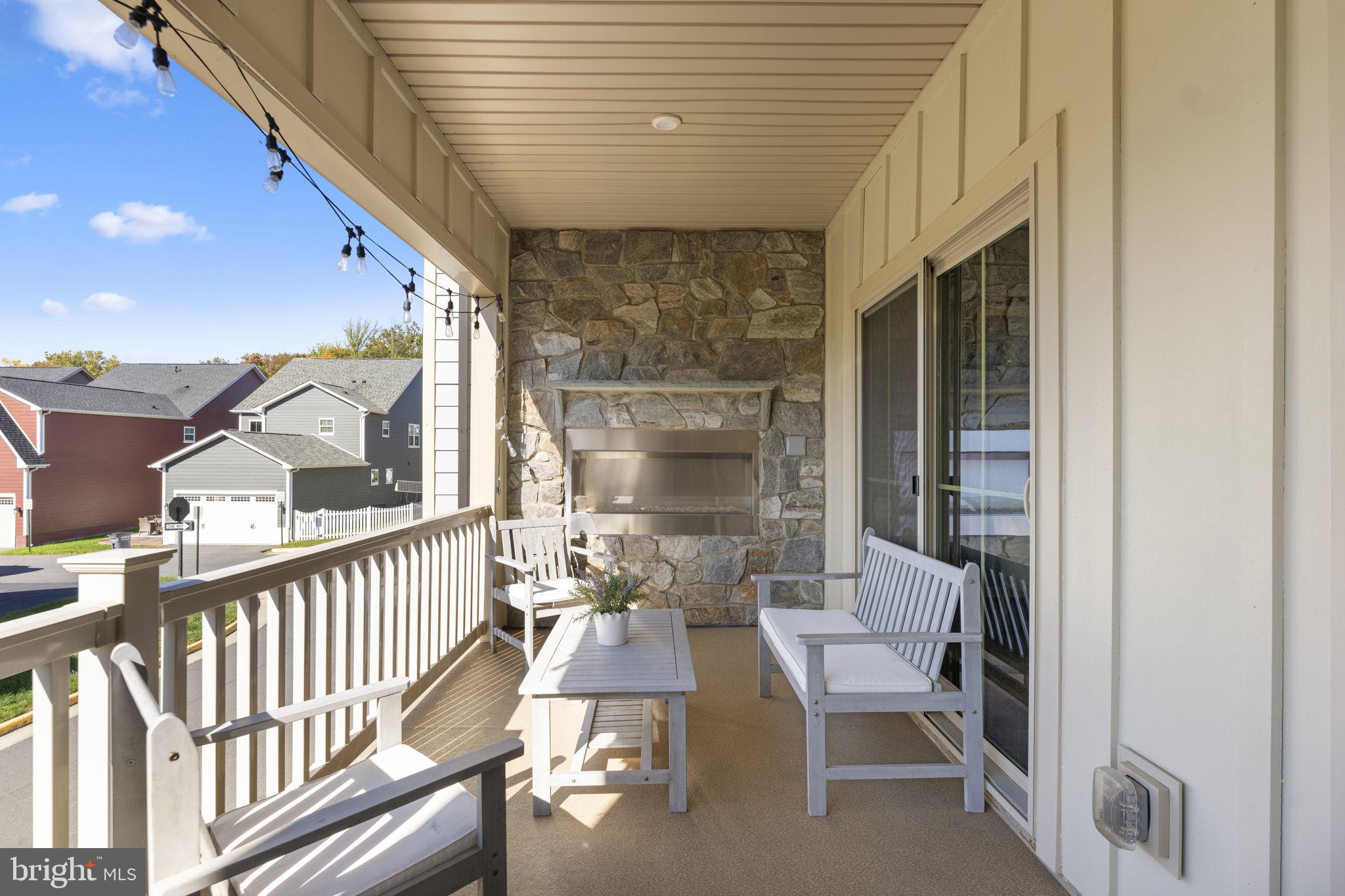 17922 Spotted Oak Road Dumfries, VA 22026 - Photo 24 of 62 Off the Kitchen w/covered Patio & Wall Fireplace