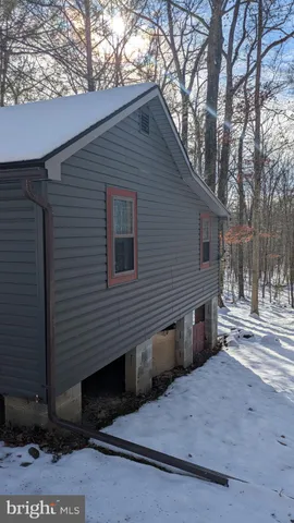 a backyard of a house with trees