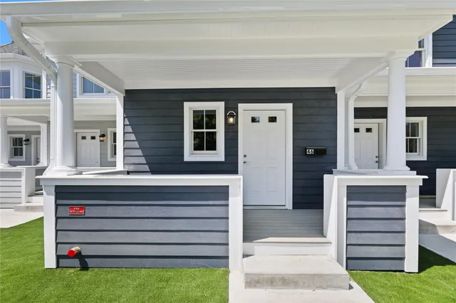 a view of house with entryway and hall