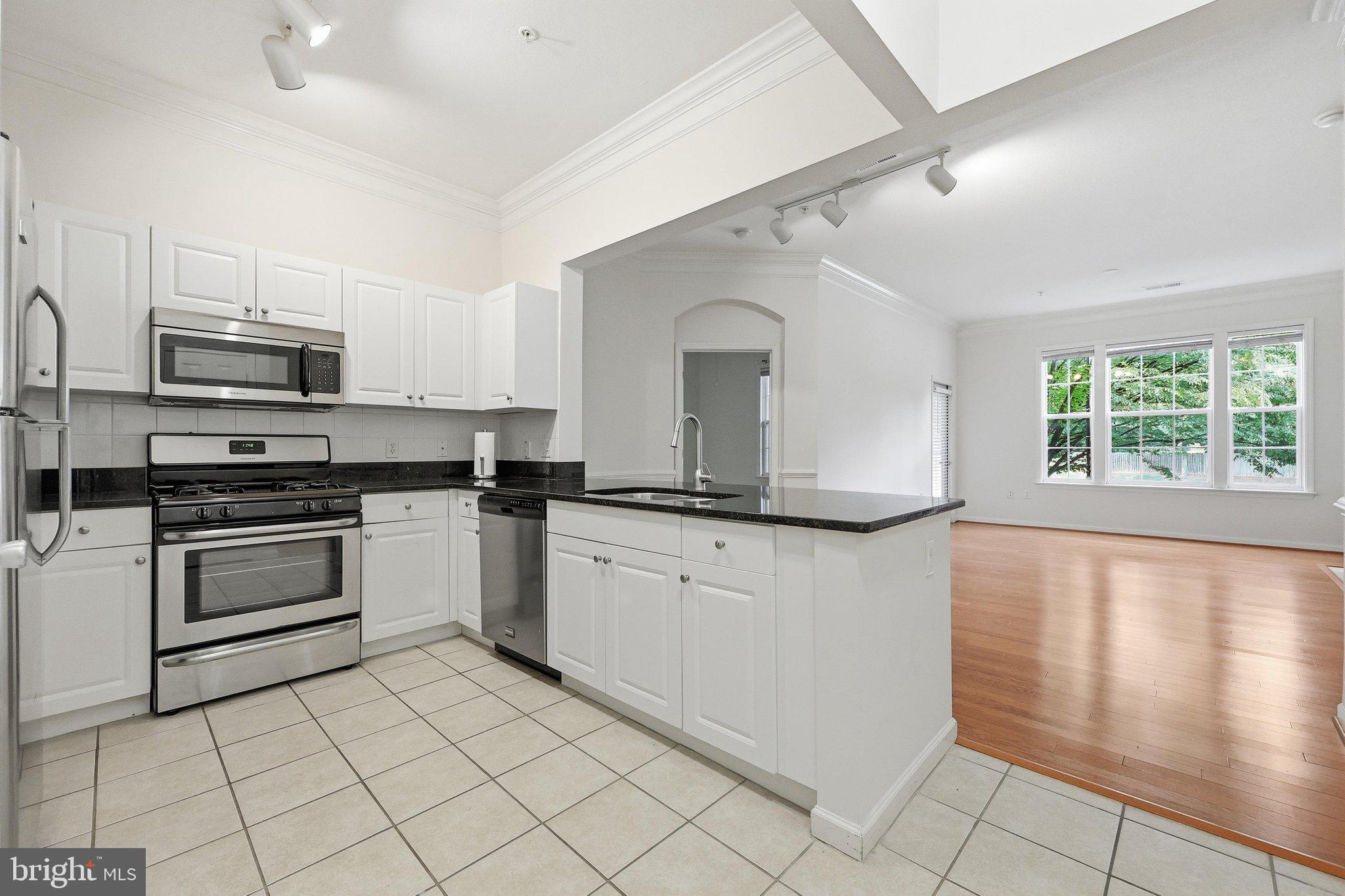 7 Booth Street, Unit 110 Gaithersburg, MD 20878 - Photo 3 of 50 White cabinets