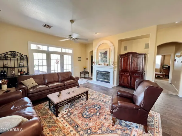 a living room with furniture or couch and a window