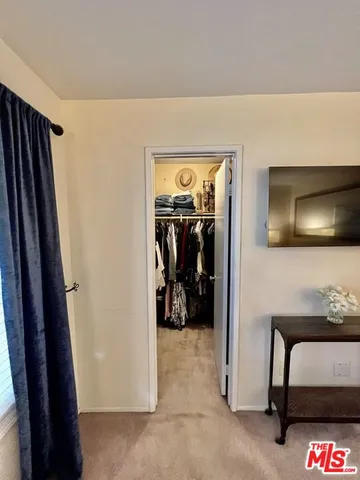 a view of livingroom with furniture and a flat screen tv
