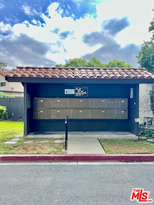 27574 Rondell Street Agoura Hills, CA 91301 - Photo 22 of 26 a view of swimming pool with a yard