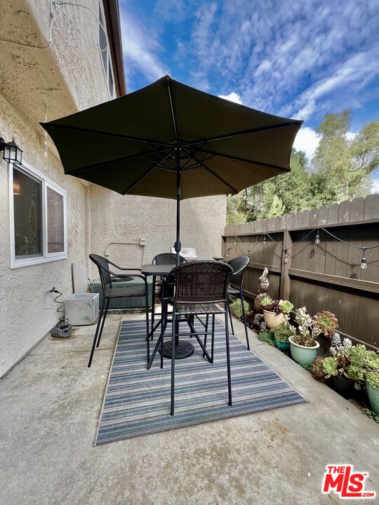 27574 Rondell Street Agoura Hills, CA 91301 - Photo 9 of 26 a view of a outdoor sitting area with furniture