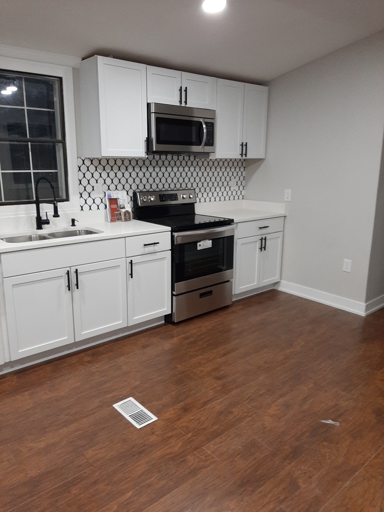 11 Hearthside Drive Matteson, IL 60443 - Photo 3 of 10 a kitchen with granite countertop a sink cabinets and stainless steel appliances