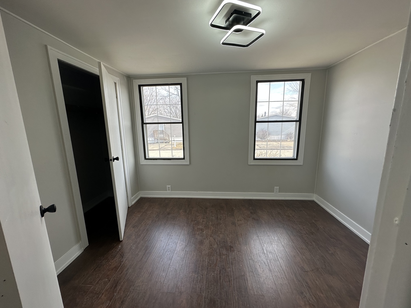 11 Hearthside Drive Matteson, IL 60443 - Photo 8 of 10 wooden floor in an empty room with a window