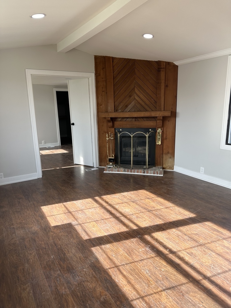 11 Hearthside Drive Matteson, IL 60443 - Photo 10 of 10 a view of empty room with wooden floor and fireplace