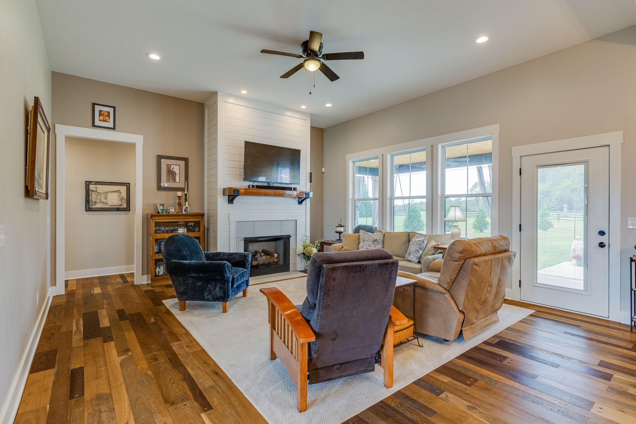2754 Union Road White House, TN 37188 - Photo 8 of 33 a living room with furniture fireplace and a flat screen tv