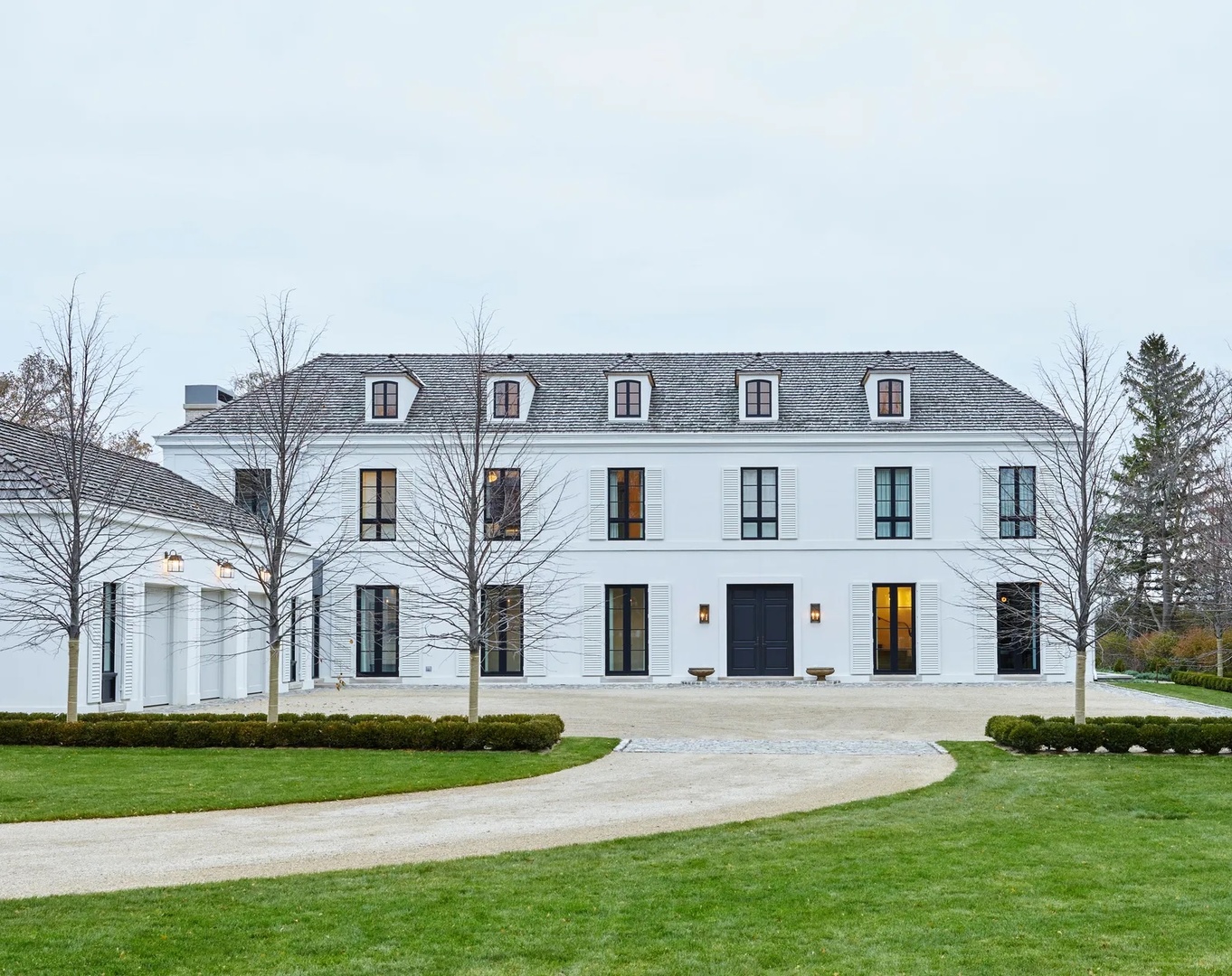 a front view of building with yard