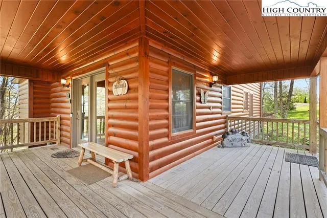 a view of porch with wooden floor