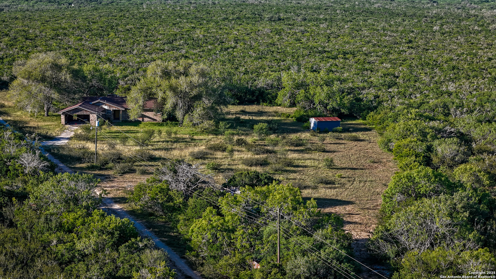 0 County Line Road, Unit 120 Beeville, TX 78102 - Photo 13 of 44 a view of a house with a yard