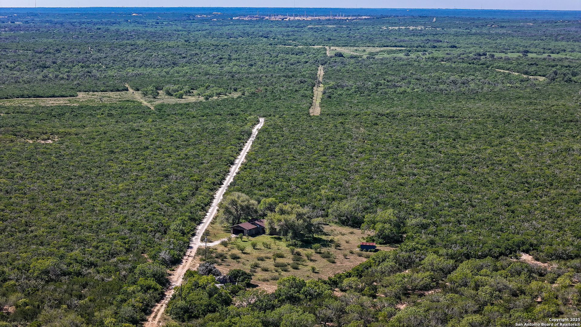0 County Line Road, Unit 120 Beeville, TX 78102 - Photo 16 of 44 a view of a green field with lots of bushes
