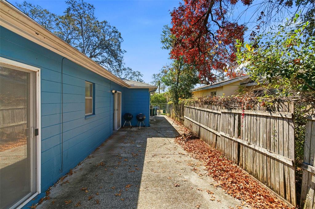 4120 East Temple Heights Road Tampa, FL 33617 - Photo 54 of 55 a view of a pathway of a house with wooden floor
