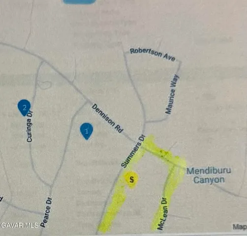 a view of a bedroom with a bed