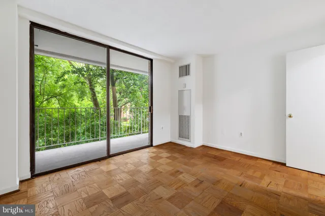a view of a big room with a large window