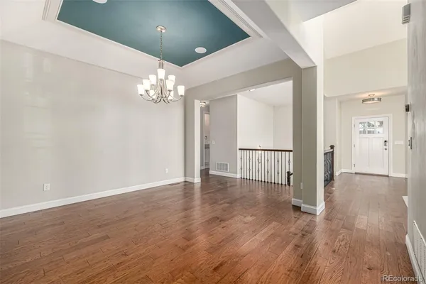 a view of a livingroom with wooden floor