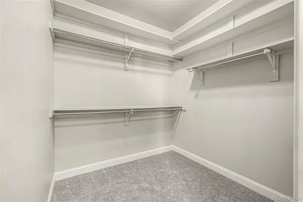 a view of an empty walk in closet