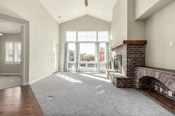 a view of livingroom with furniture and floor to ceiling window