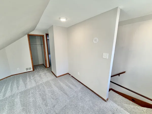 a view of an empty room with window