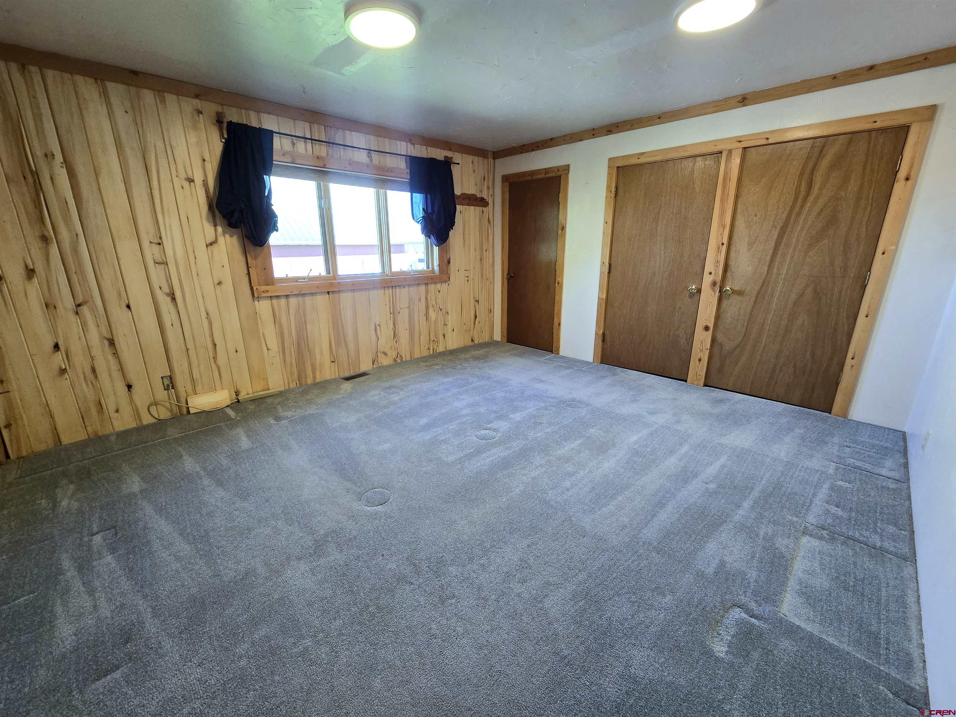 23435 County Rd M Cortez, CO 81321 - Photo 10 of 27 an empty room with windows