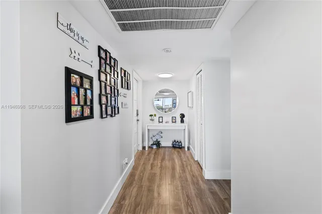 a bed room with a bed and a television