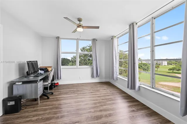 a view of a room that has a window