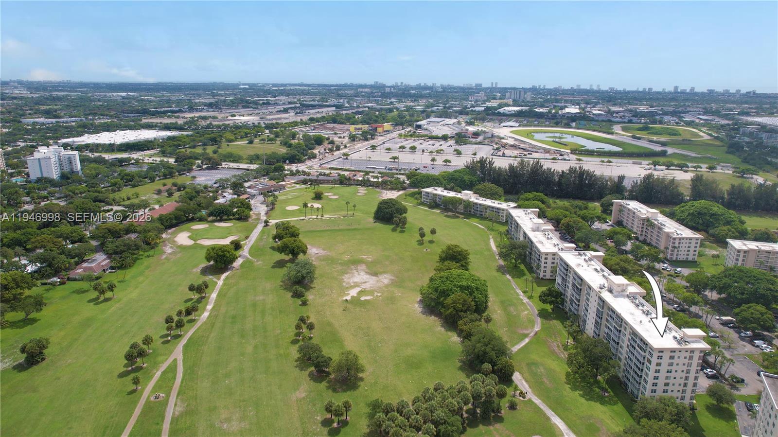 2661 South Course Drive, Unit 510 Pompano Beach, FL 33069 - Photo 34 of 49 an aerial view of residential houses with outdoor space