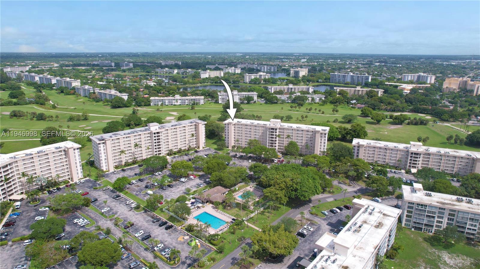 2661 South Course Drive, Unit 510 Pompano Beach, FL 33069 - Photo 44 of 49 an aerial view of a city with lots of residential buildings