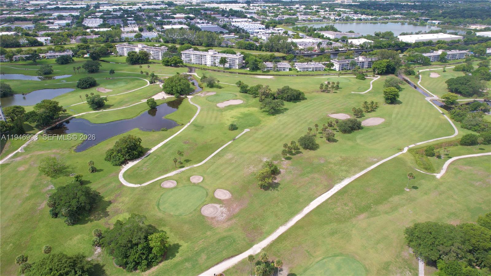 2661 South Course Drive, Unit 510 Pompano Beach, FL 33069 - Photo 48 of 49 a view of a lake