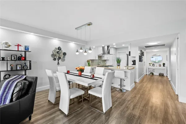 a view of kitchen dining table and chairs