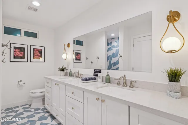 a bathroom with a sink and a shower