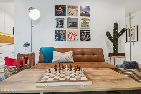 a living room with furniture and rug