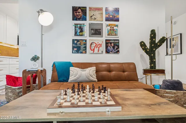 a living room with furniture and rug