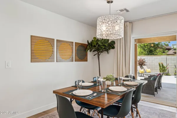 a view of a dining room with furniture