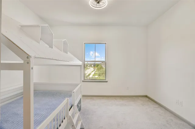 a bathroom with a sink a toilet a bathtub and shower