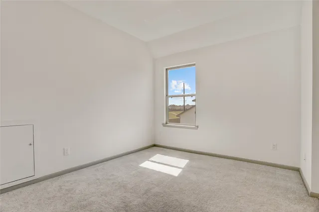 a bathroom with a bathtub sink vanity and a mirror