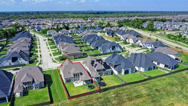 a living room filled with furniture and a garden
