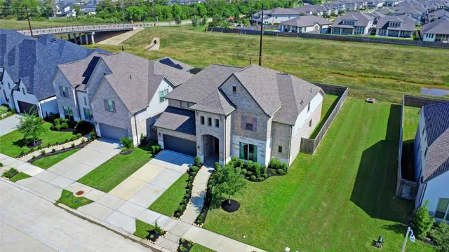 a view of house with backyard porch and outdoor seating