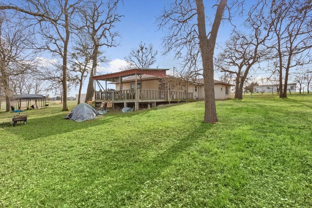 1832 West White Oak Road West, TX 76691 - Photo 25 of 30 a view of a house with a yard