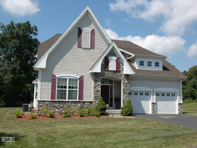 3 Colonial Court Middlebury, CT 06762 - Photo 1 of 1 a front view of a house with a yard