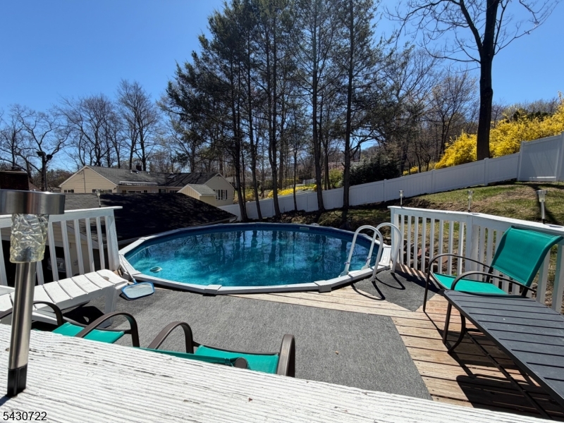 544 Goffle Hill Road Hawthorne, NJ 07506 - Photo 25 of 26 a view of outdoor space swimming pool and deck