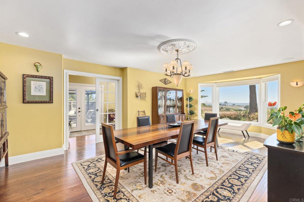 29460 Twain Valley Center, CA 92082 - Photo 11 of 75 a view of a dining room with furniture window and wooden floor