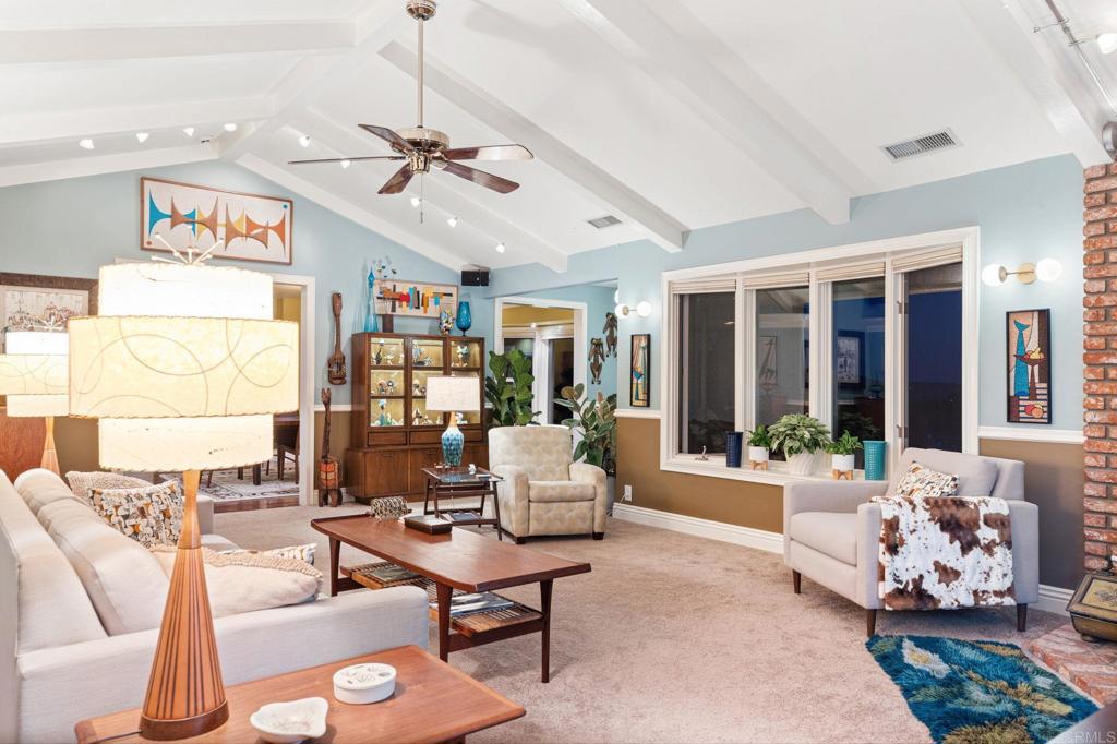 29460 Twain Valley Center, CA 92082 - Photo 30 of 75 a living room with furniture ceiling fan and a window
