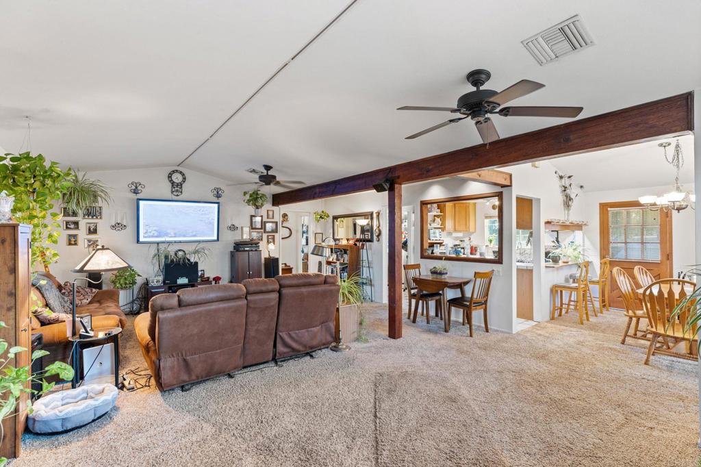 29460 Twain Valley Center, CA 92082 - Photo 51 of 75 a living room with furniture and a ceiling fan