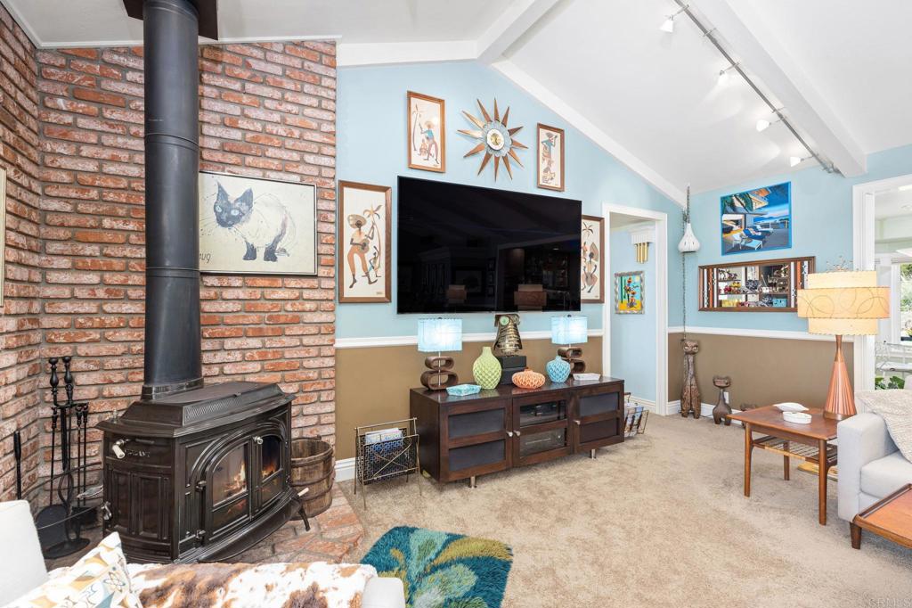 29460 Twain Valley Center, CA 92082 - Photo 61 of 75 a living room with furniture and a flat screen tv