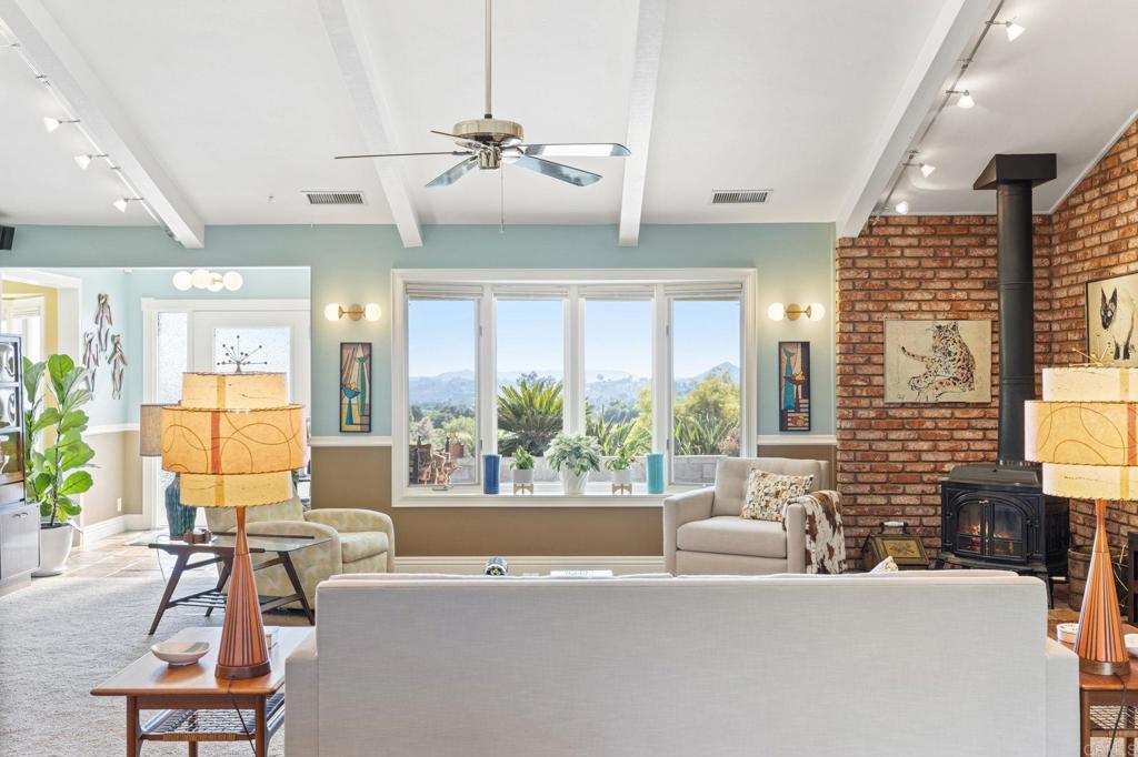 29460 Twain Valley Center, CA 92082 - Photo 9 of 75 a living room with furniture and floor to ceiling windows