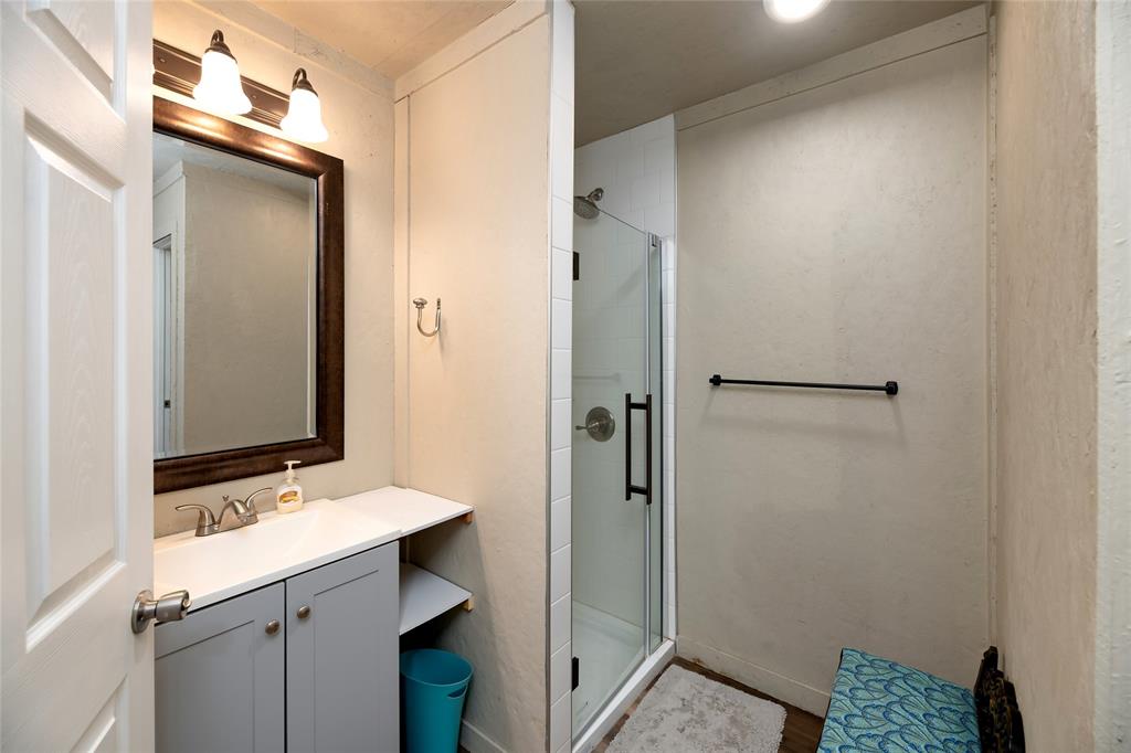 2261 Highway 276 Emory, TX 75440 - Photo 26 of 35 a bathroom with a sink and a mirror