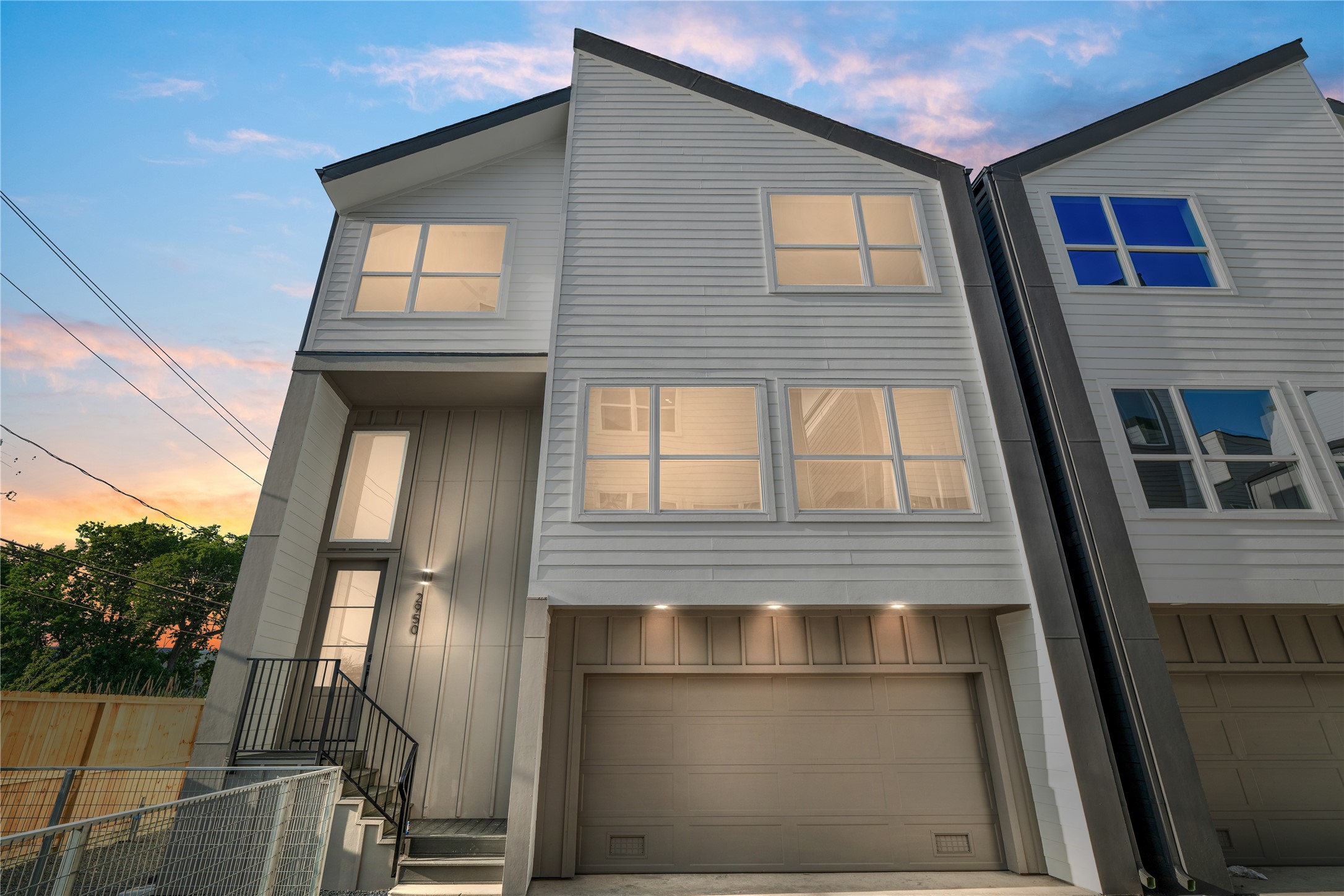 2950 Pitzlin Street Houston, TX 77023 - Photo 3 of 37 Defined by clean edges and geometric clarity, the front elevation reflects a contemporary take on urban elegance.