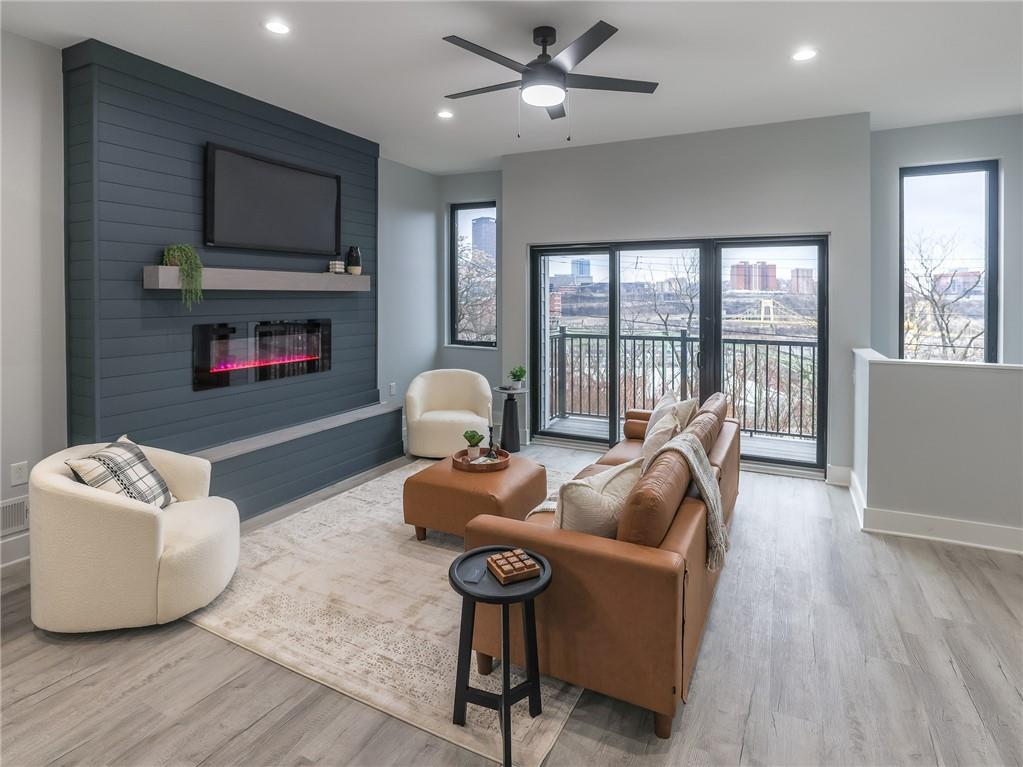 622 Windom Street Pittsburgh, PA 15203 - Photo 4 of 26 Super trendy electric fireplace. Notice all of the windows maximizing the view.